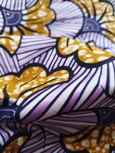 Charger l'image dans la galerie, Tissu wax irisé - fleurs de mariage mordorées fond irisé parme - par 50 centimètres