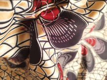 Charger l'image dans la galerie, Tissu wax java - plumes fond champagne irisé - par 50 centimètres