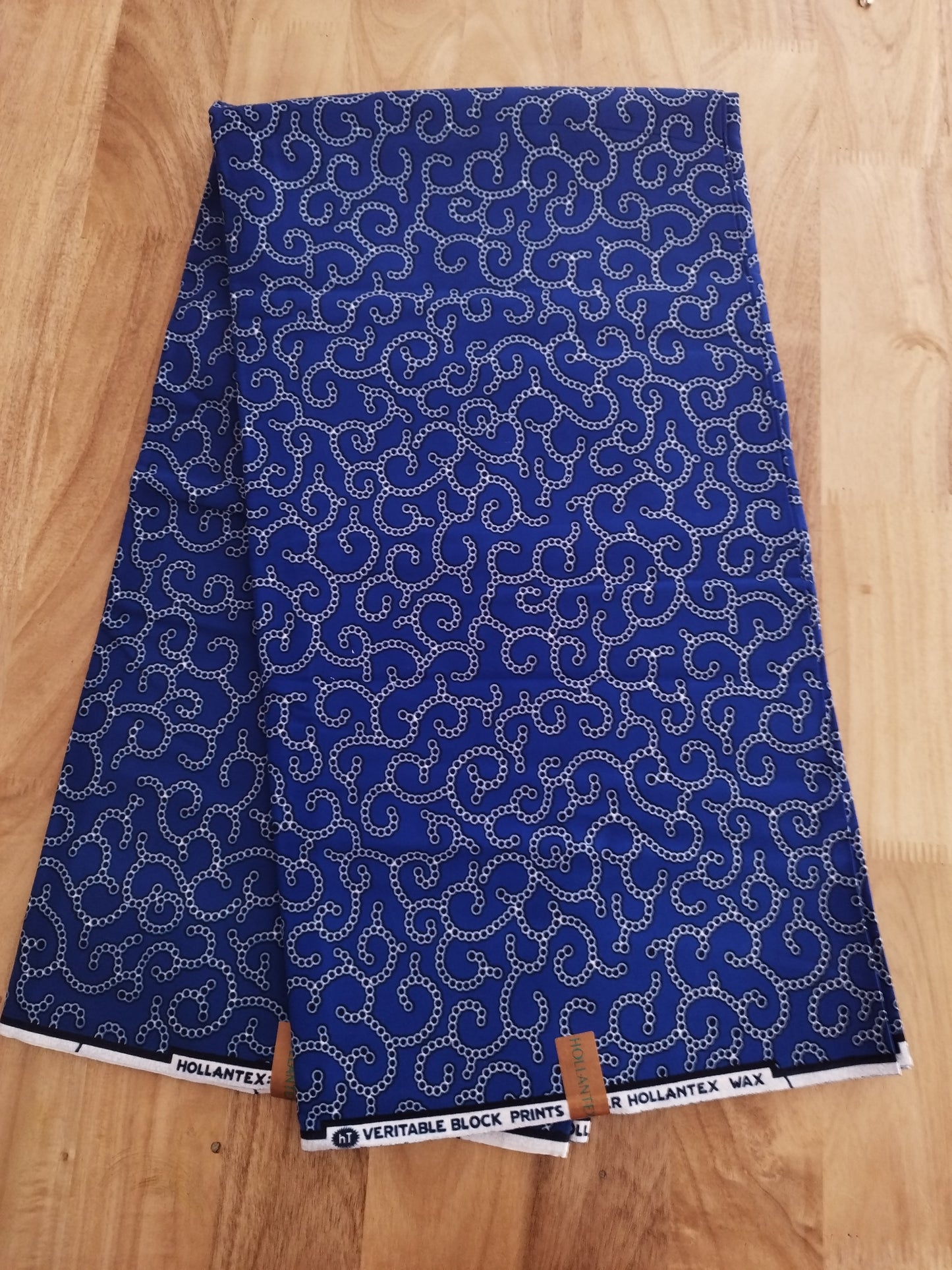 1 yard (90 cm) - Tissu wax - macaronis blancs sur fond bleu