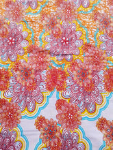 Charger l&#39;image dans la galerie, Tissu wax - grandes fleurs roses, oranges, jaunes, bleues - par 50 centimètres
