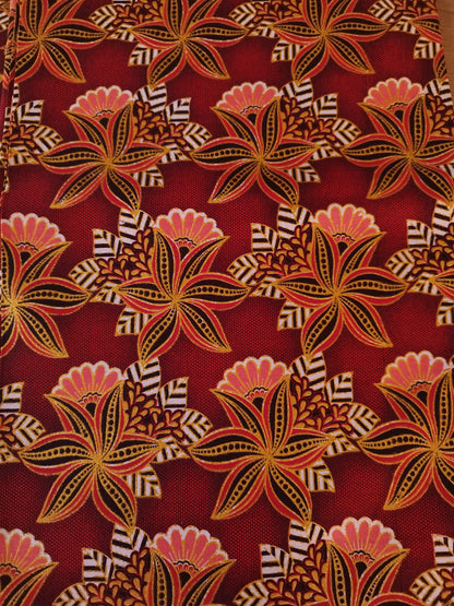 1 yard (90 cm) - Tissu wax pailleté - petites fleurs corail et dorées fond rouge