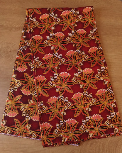 1 yard (90 cm) - Tissu wax pailleté - petites fleurs corail et dorées fond rouge