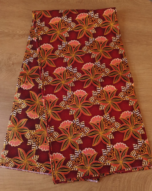 1 yard (90 cm) - Tissu wax pailleté - petites fleurs corail et dorées fond rouge