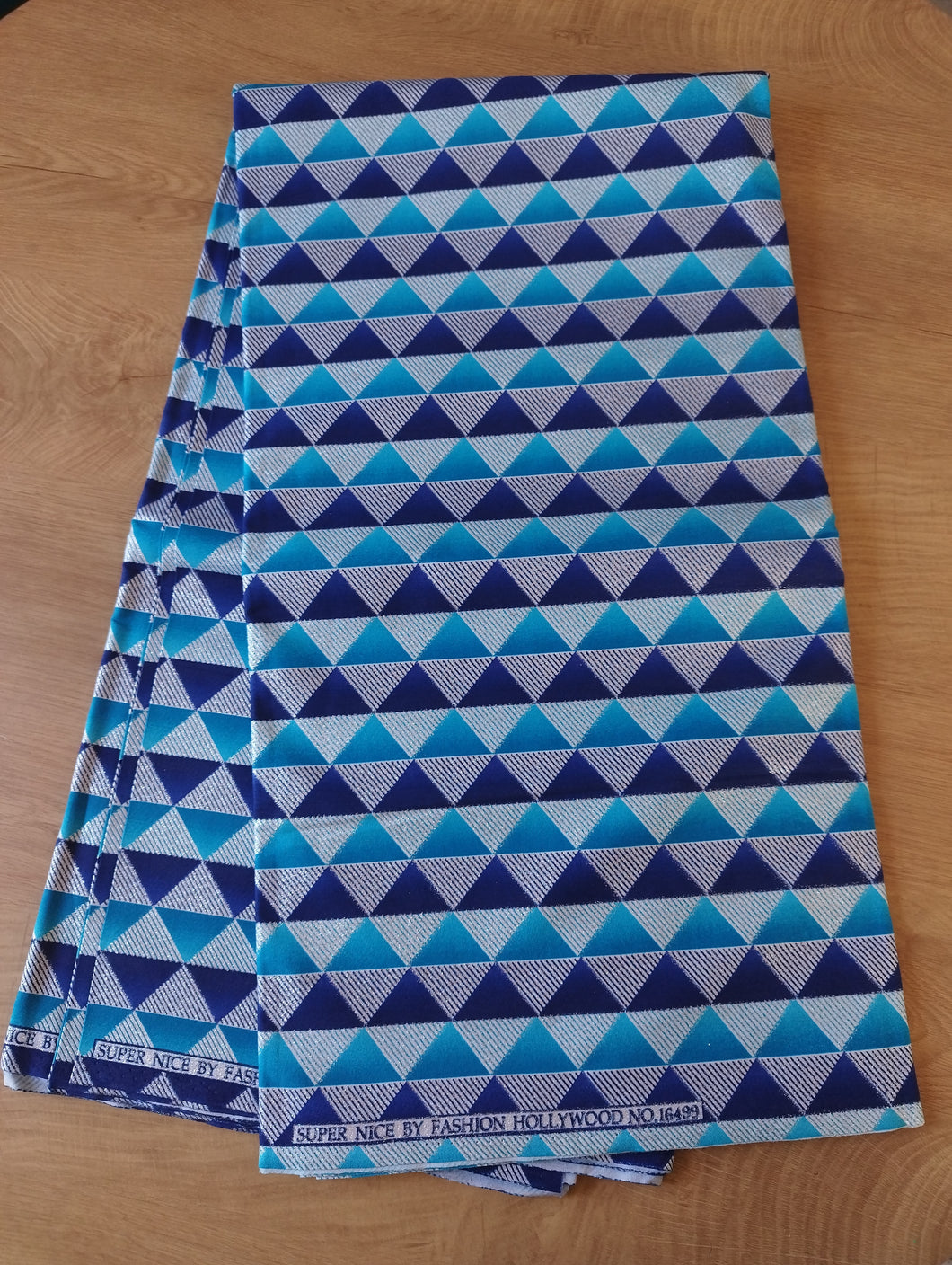 Tissu wax pailleté - Triangles bleus et argent - par 50 centimètres