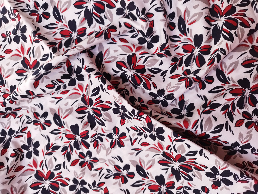 Tissu coton - fleurs rouges et noires - par 50 centimètres