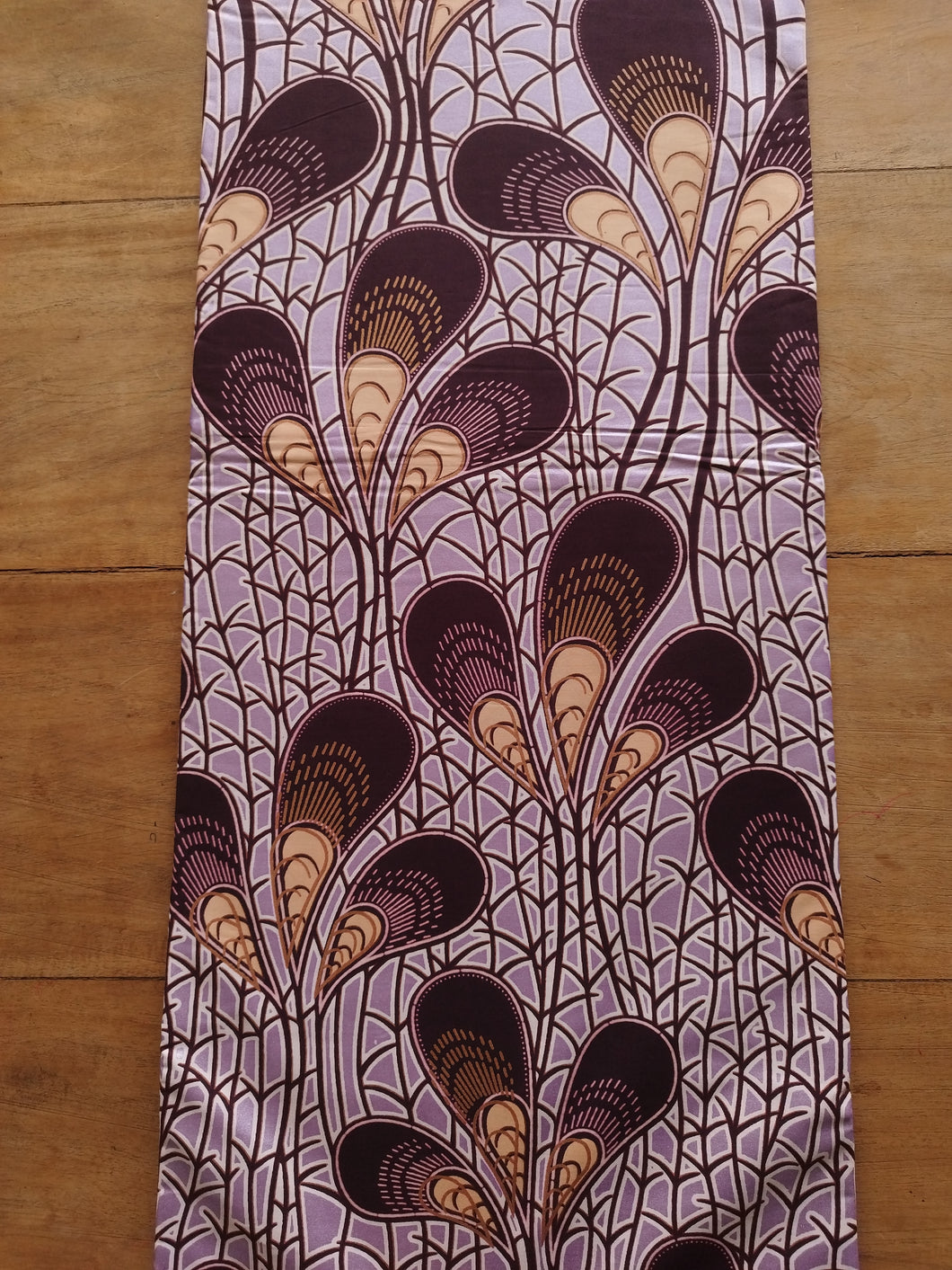 Tissu wax java - plumes corail fond violet irisé - par 50 centimètres