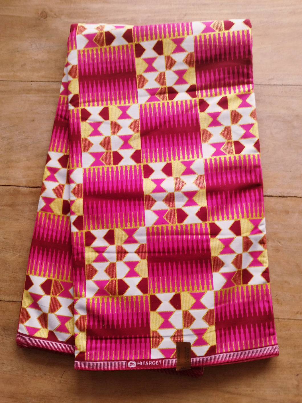 Tissu wax kente - imprimé kente rose, blanc, jaune et doré  - à partir de 50 centimètres