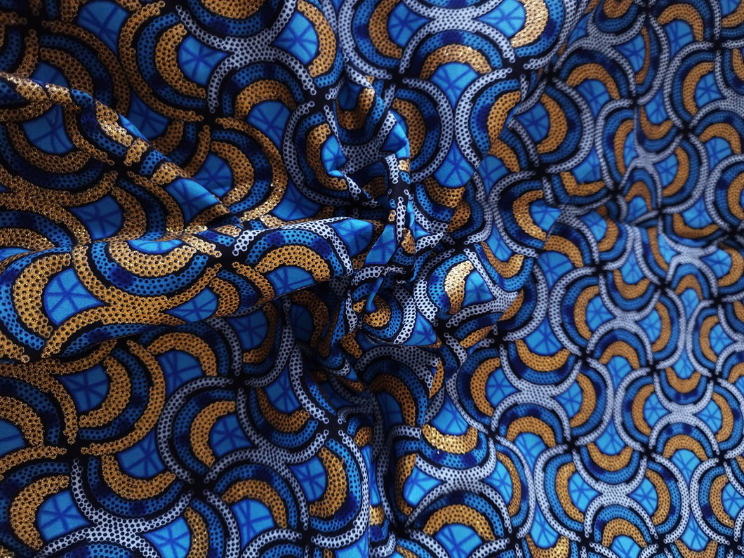Tissu wax pailleté - petits motifs bleus et pailleté doré - par 50 centimètres