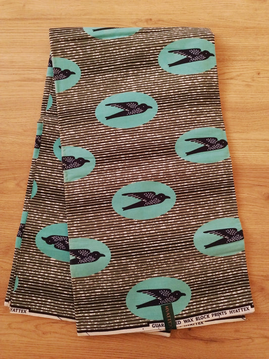 1 yard (90 cm) - Tissu wax hirondelles sur fond vert